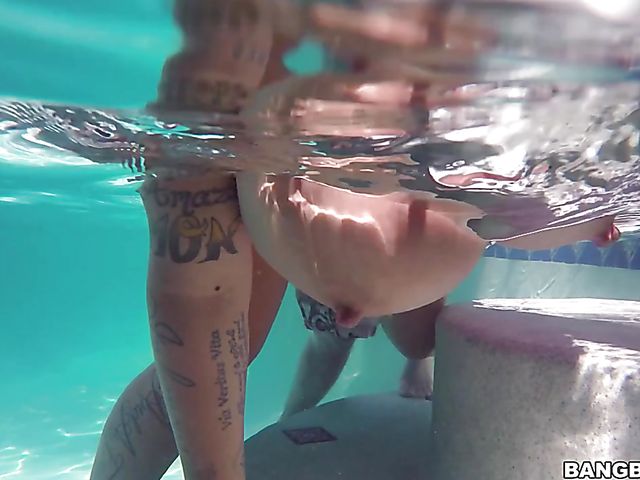 Brandy Talore with huge natural tits fucked in the pool