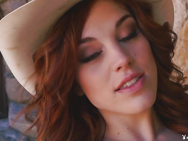 Curvy redhead Molly Stewart shows her snatch in the desert