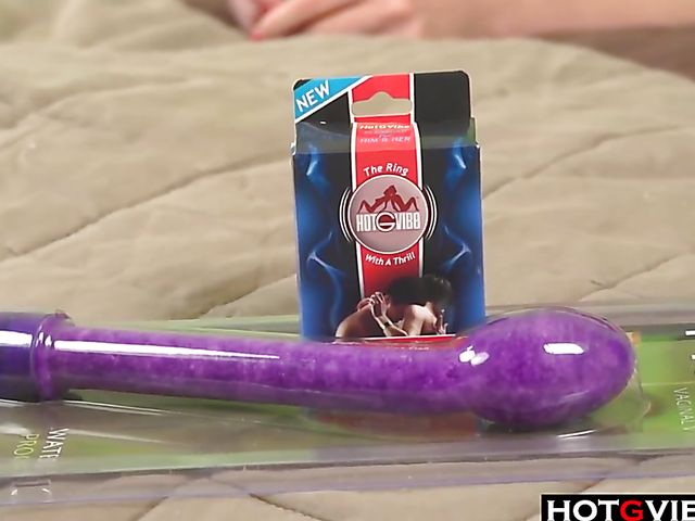 Blonde bares her fake boobs and masturbates with her toys