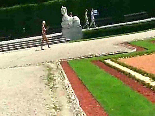 Glamorous blonde walks around outside naked in public