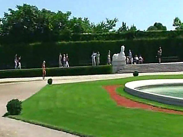 Glamorous blonde walks around outside naked in public