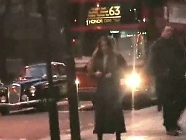 An amazing babe gets naked in the streets