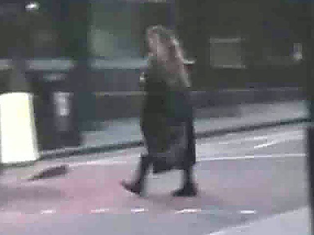 An amazing babe gets naked in the streets