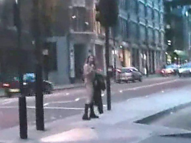 An amazing babe gets naked in the streets