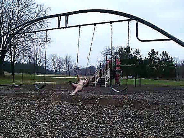 An amazing babe gets naked in the streets