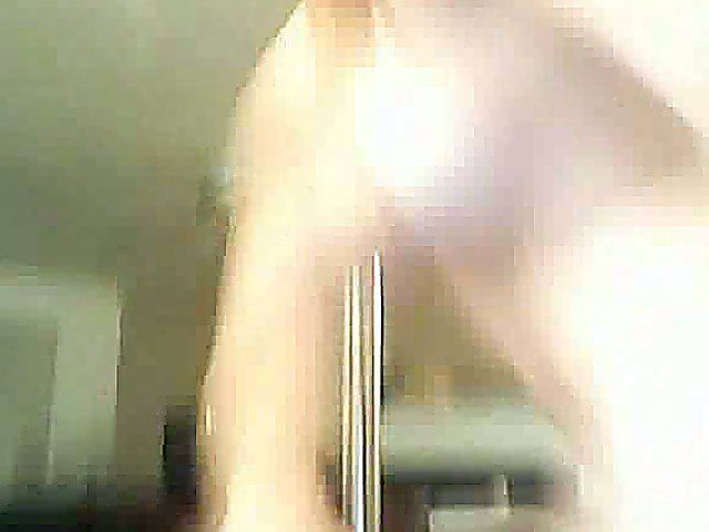 Two beautiful babes pose naked and suck cock