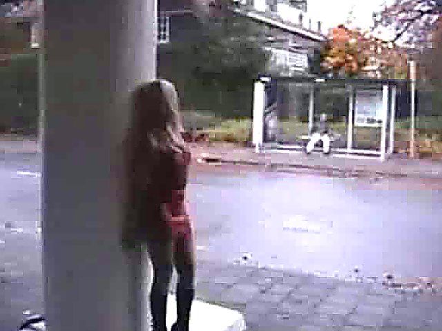 Beautiful blonde with big tits posses naked outside