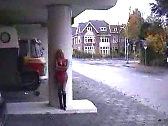 Beautiful blonde with big tits posses naked outside