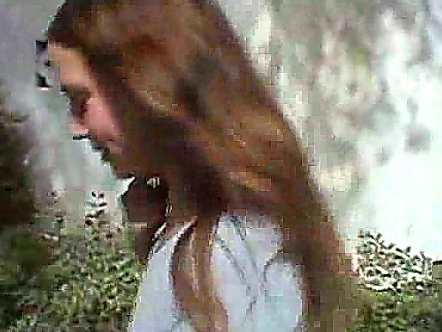 Beautiful babe strips and shows of her titties