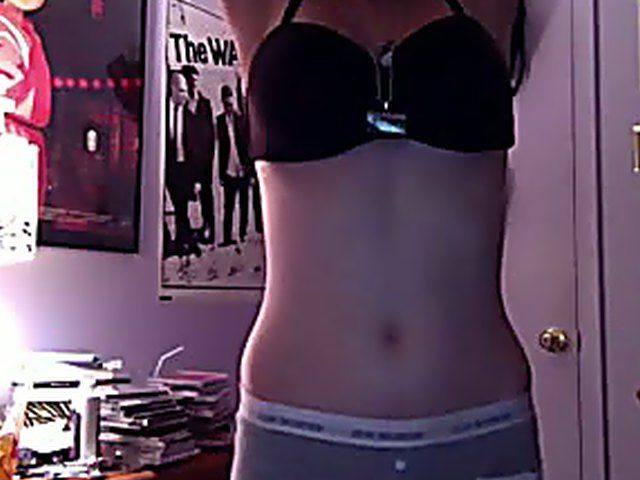 Beautiful babe spreads her legs and masturbates