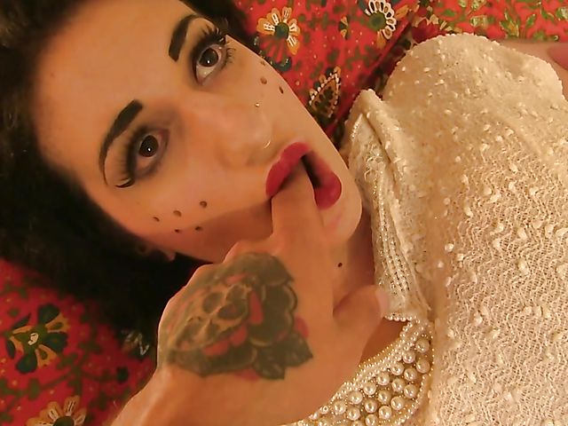 Alt brunette pretends to be a doll and gets face fucked