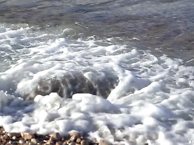 Bikini model Tahlia Paris posing naked on the beach