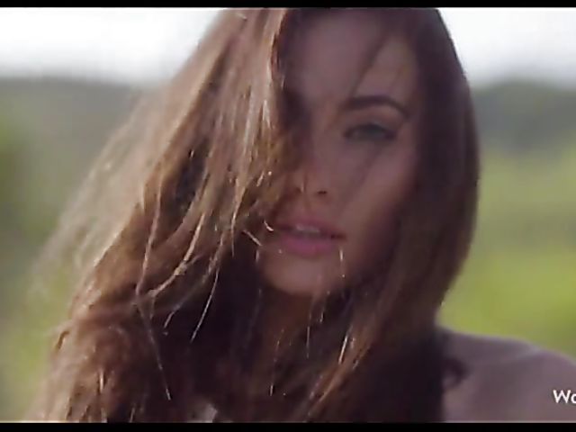 Stunning Michaela Isizzu posing nude and fingering outdoors