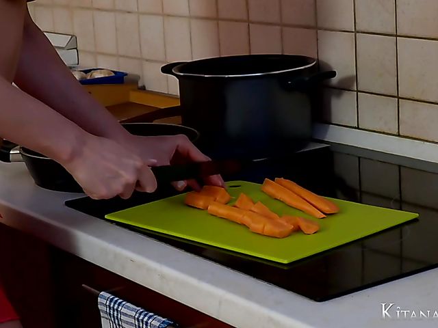 Big tits pornstar Kitana Lure cooking topless