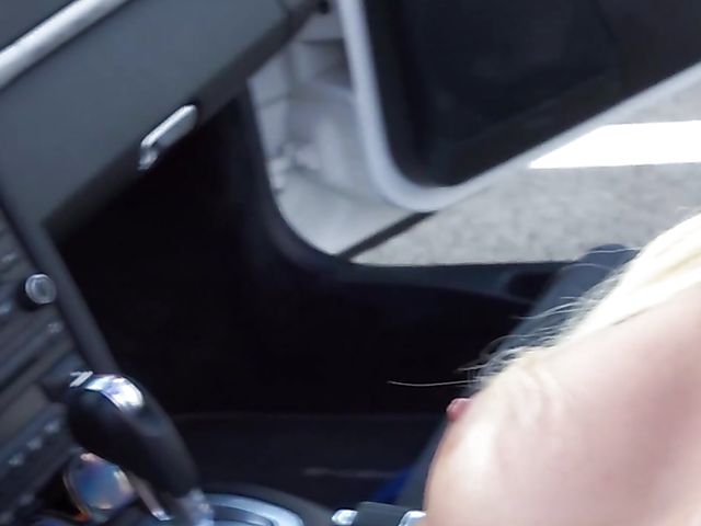 Busty blonde Kitana Lure driving topless and using dildos