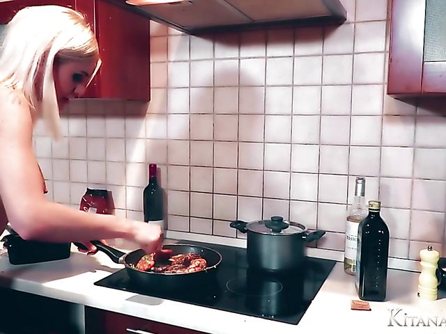 Perfect blonde Kitana Lure with big hooters goes wild in the kitchen