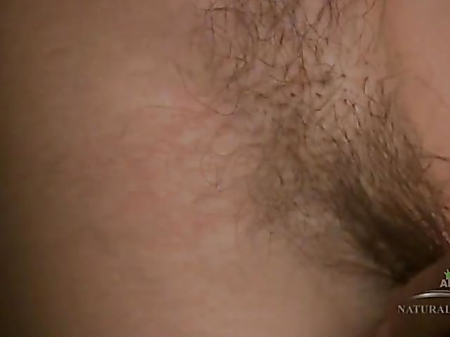 Yoga girl Kalei spreads her hairy cunt by the fire