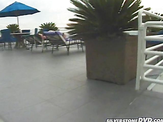 Outdoor lesbian fun by the pool