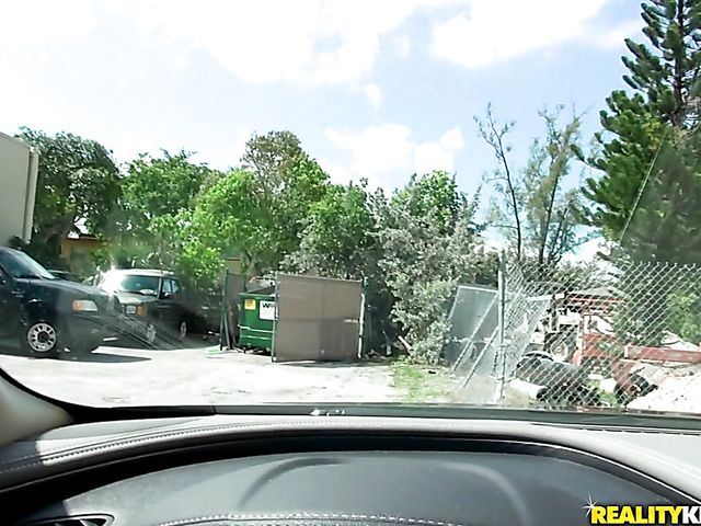 Curly teen Avaina Lace blows in the car and gets fucked