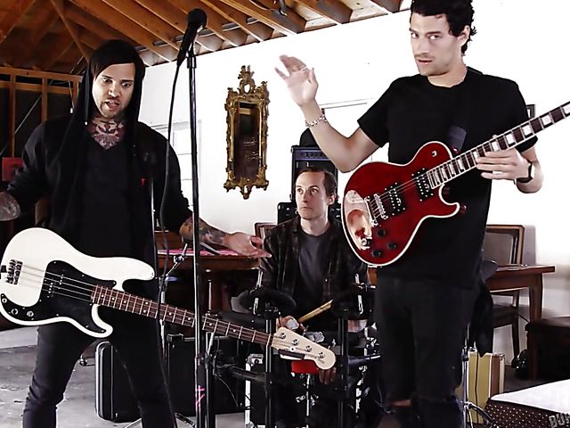 Big tit MILF Nina Elle gets tag teamed with her mask on