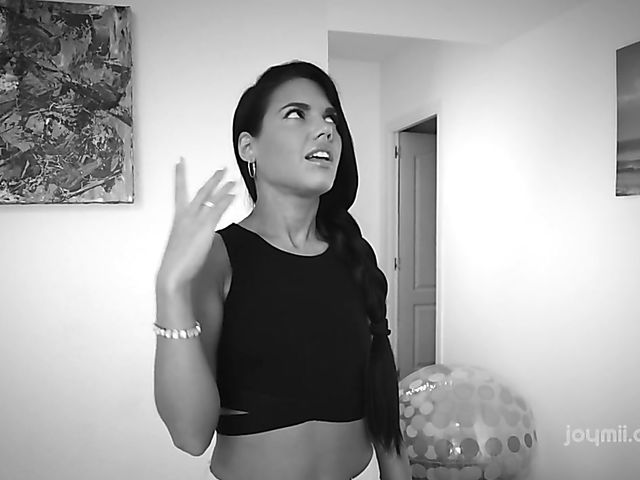 Apolonia Lapiedra solo fingering in red armchair