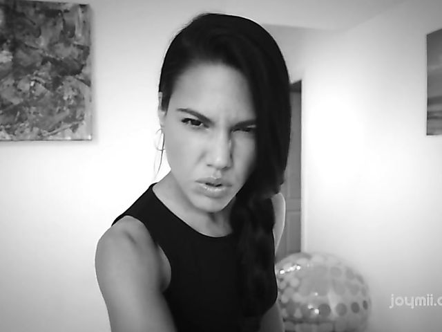 Apolonia Lapiedra solo fingering in red armchair