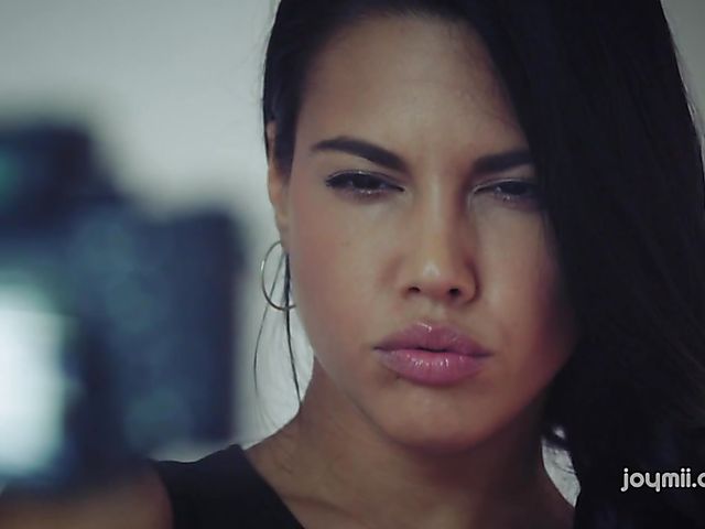 Apolonia Lapiedra solo fingering in red armchair