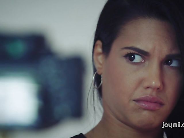 Apolonia Lapiedra solo fingering in red armchair