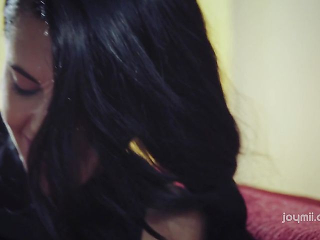 Apolonia Lapiedra solo fingering in red armchair