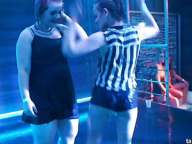 Wet drunk girls dancing at a party