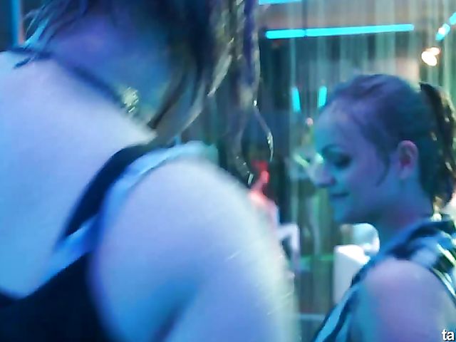 Wet drunk girls dancing at a party