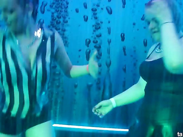 Wet drunk girls dancing at a party
