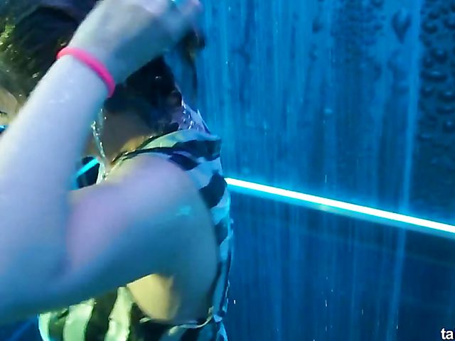 Wet drunk girls dancing at a party