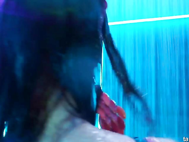 Wet drunk girls dancing at a party