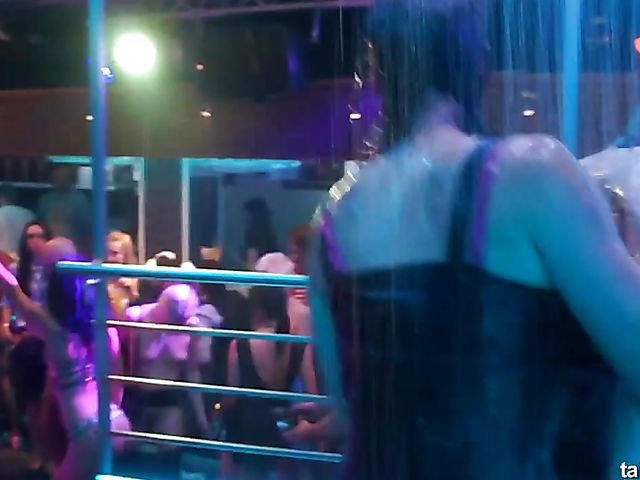 Wet drunk girls dancing at a party