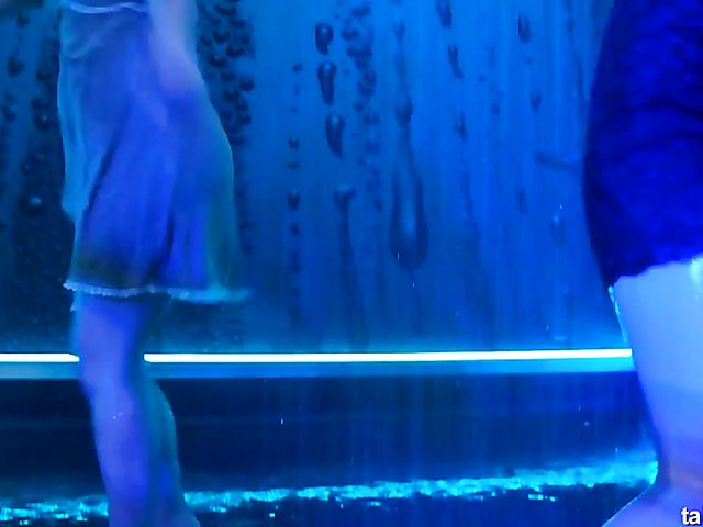 Wet drunk girls dancing at a party