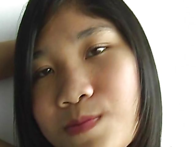 Cute Asian teen strips to reveal her perky little titties
