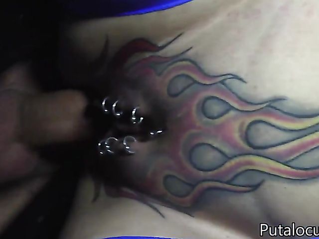 Pierced Candela X gets her tattooed pussy fucked in the gloryhole